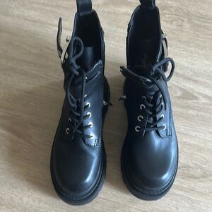 Michael Kors. Sleek Black Combat Boots with Silver Accents